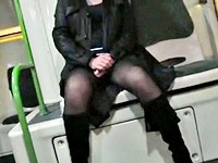 The long legged girl is sitting opposite the upskirt hunter providing him with the extra ordinary black pantyhose and boots upskirt